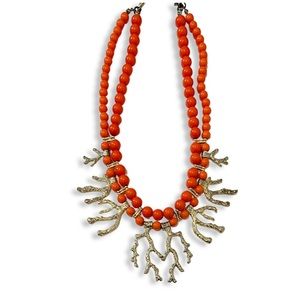 Orange and gold coral beaded necklace.
